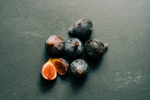 Figs over black surface